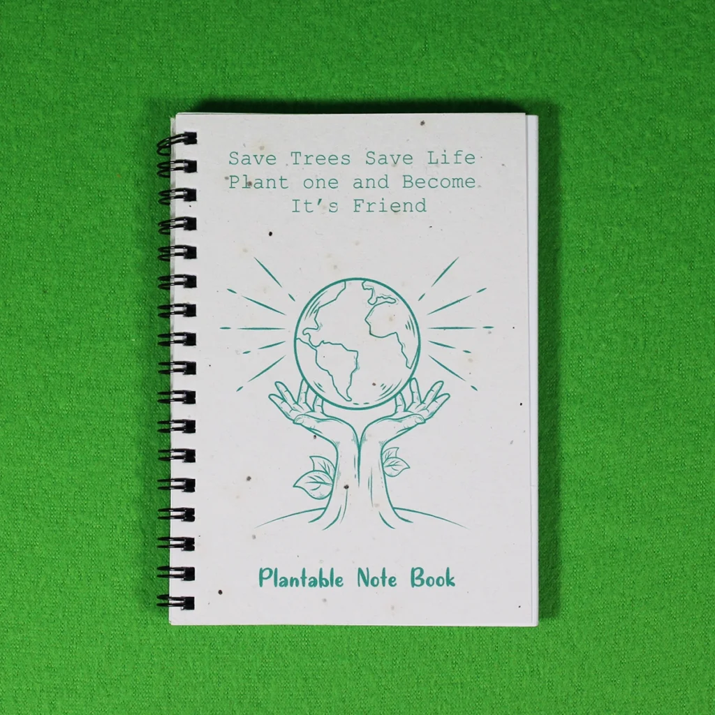 Eco-friendly 14.5 x 11 cm plantable notebook with Earth and tree artwork and “Save Trees Save Life” message on the cover